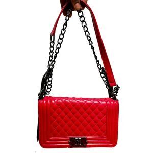 Bright red fuchsia leather quilted crossbody bag with black chain strap